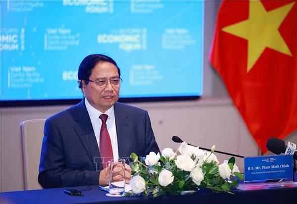 Le Premier ministre Pham Minh Chinh rencontre des responsables de groupes financiers internationaux