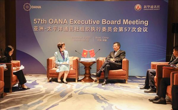 Làm sâu sắc hơn mối quan hệ hợp tác truyền thống giữa TTXVN và Tân Hoa xã