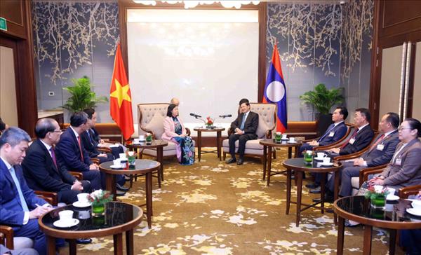 Front leader meets Lao Party General Secretary, President
