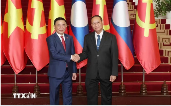 ຜູ້ປະຈຳການຄະນະເລຂາທິການສູນກາງພັກ ເຈິ່ນເກິມຕູ ເປັນສັກຂີພິຍານພິທີແລກປ່ຽນເອກະສານຮ່ວມມື ຫວຽດນາມ - ລາວ