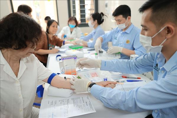 Vietnam moves to expand health insurance coverage, including preventive care and check-ups