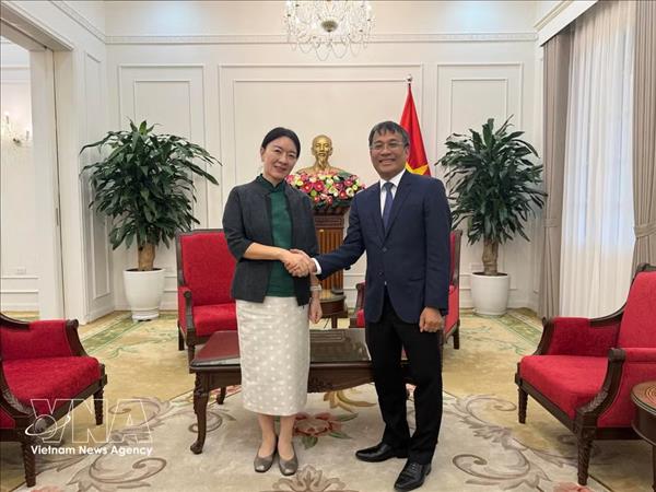 Le vice-ministre des AE Nguyên Minh Vu reçoit la vice-présidente du Guangxi de Chine