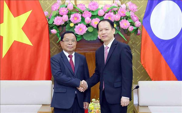 Vietnamese, Lao justice ministers vow deeper collaboration during talks