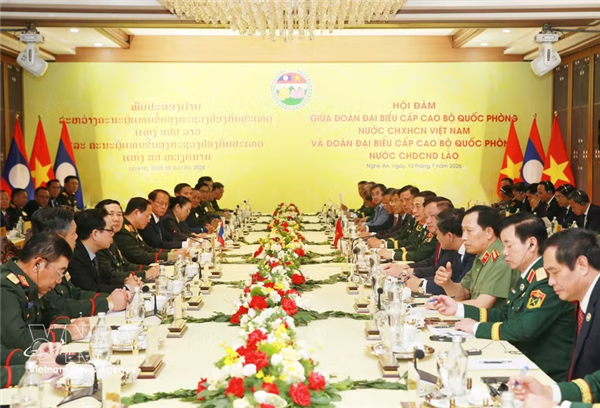 越老两国国防部高级代表团举行会谈