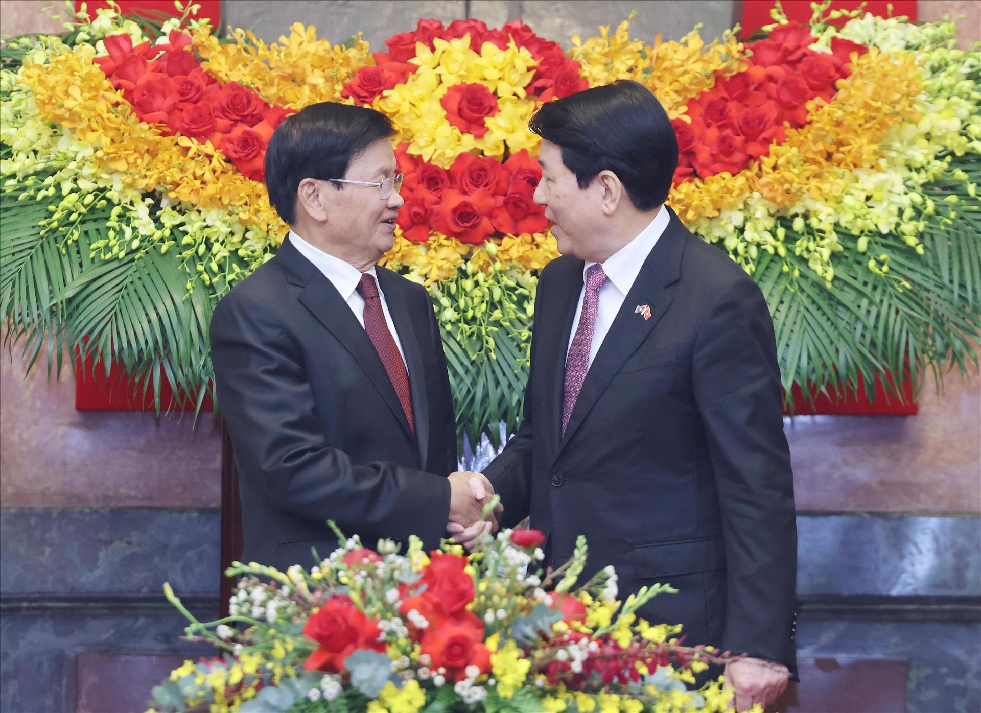 Vietnamese State President meets with top Lao leader in Hanoi