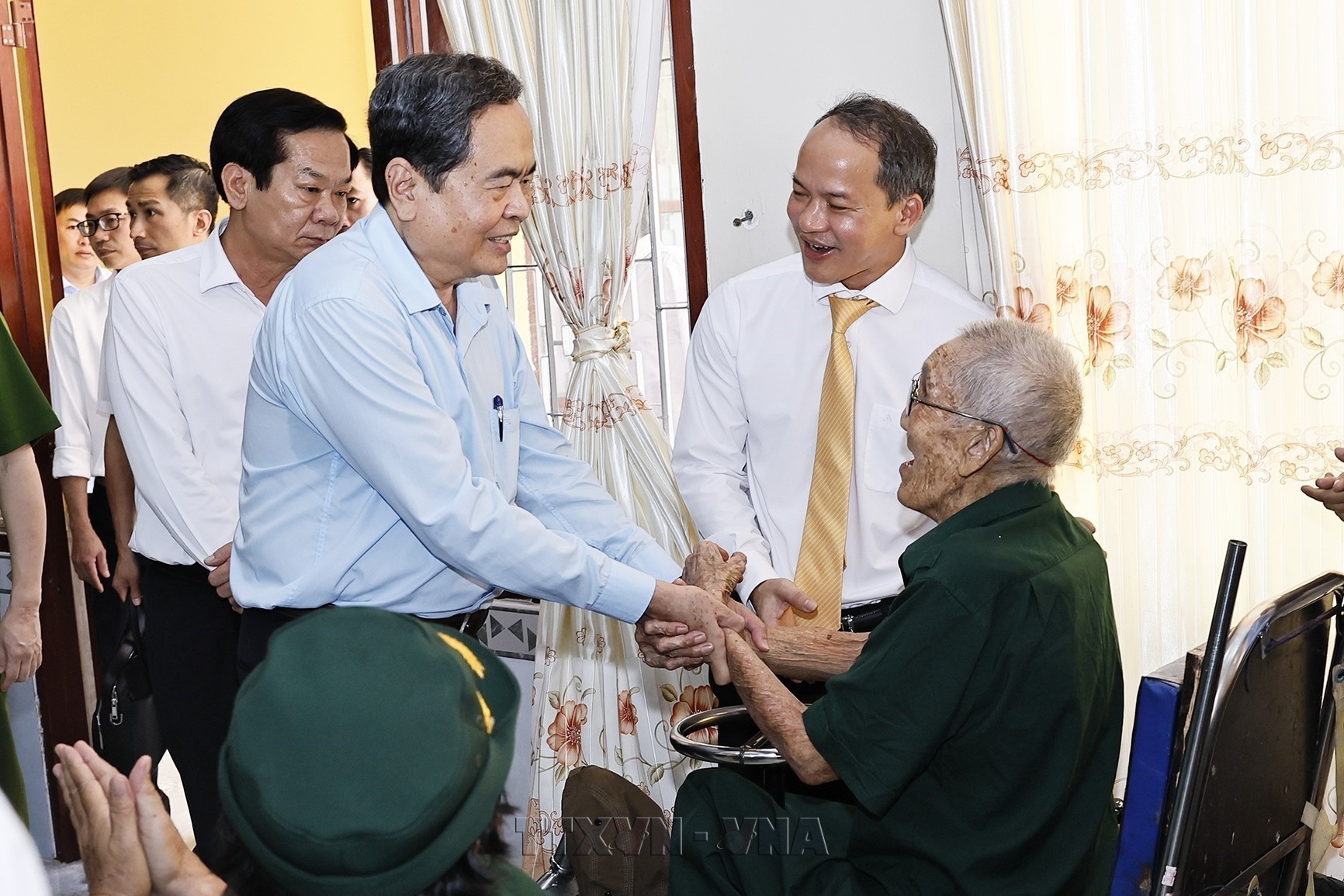Top legislator underscores importance of providing better care for revolution contributors