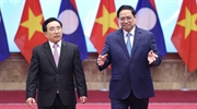 Vietnam Laos stand side by side in development path
