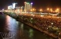 Tens of thousands of people gather along the banks of the Han River to watch the fireworks shows.