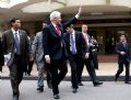 Former President Bill Clinton takes a stroll on Hanoi streets.