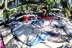 Windsurfers prepare their equipment for the competition. Photo: Huu Thanh