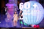 Earth Hour Ambassador Thanh Lam and her daughter, Thien Thanh, perform together the song “Tre xanh ru” to call for people to save energy and protect the environment. Photo: Cong Dat