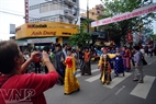 Mongolian artists parade on a street. Photo: Tran Thanh Giang