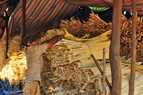 Dried Buong leaves are carefully covered before being sold.