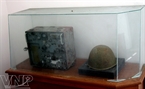 A walkie-talkie and an iron hat of soldiers who protected Hon Dau Island during the war. 