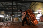 Porters often have to carry barrels weighing hundreds kilogram of goods using rickshaws.