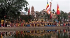 The procession at the festival in Trieu Khuc Village is aimed at commemorating national hero Phung Hung and teaching the children the national traditions.