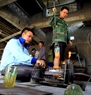 Cutting using gas fire. Photo: Tran Thanh Giang/VNP