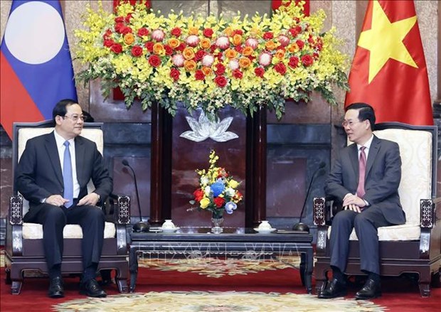 State President Hosts Lao Prime Minister In Hanoi